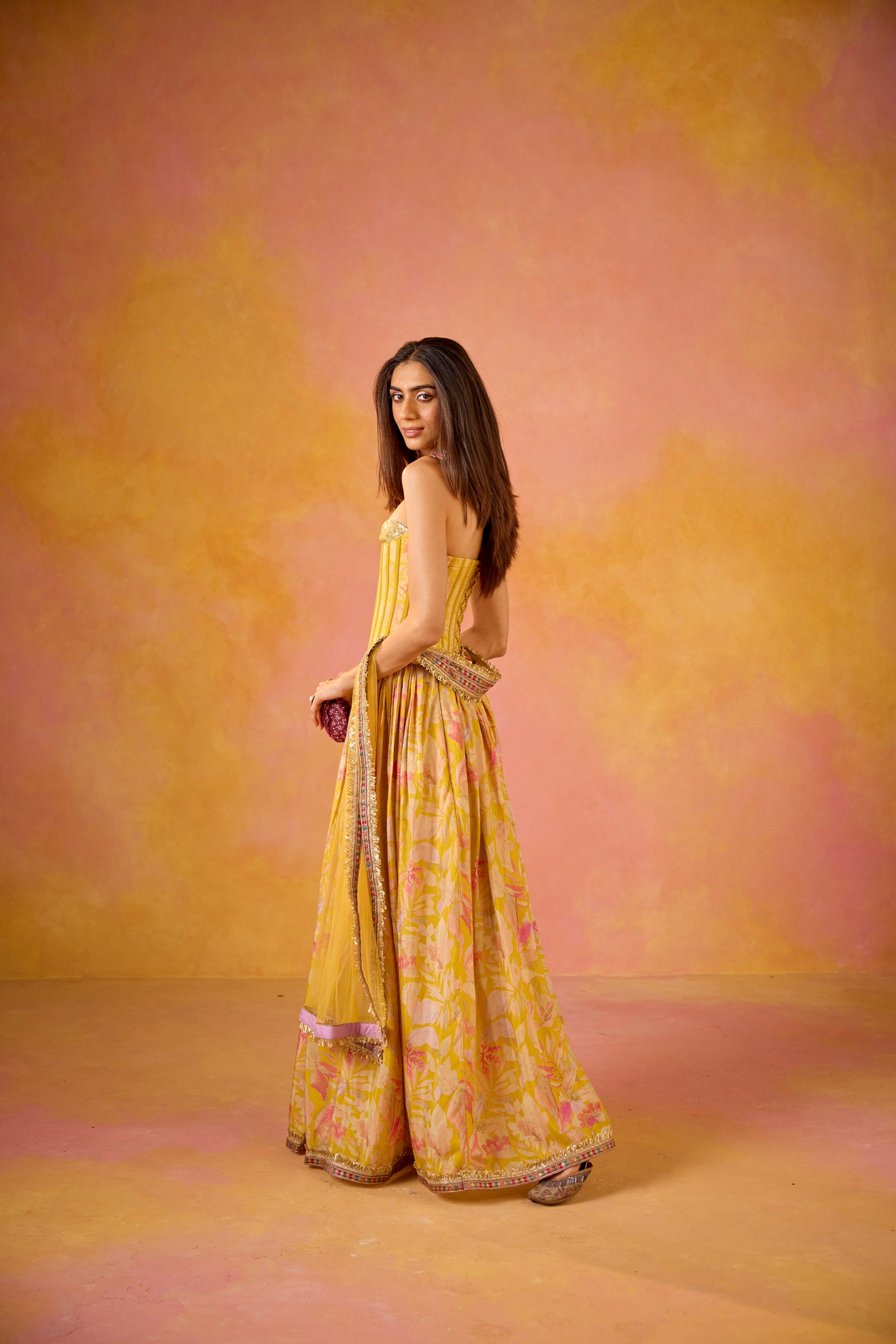 Anaya Yellow Sequinned Corset Muslin Lehenga Set