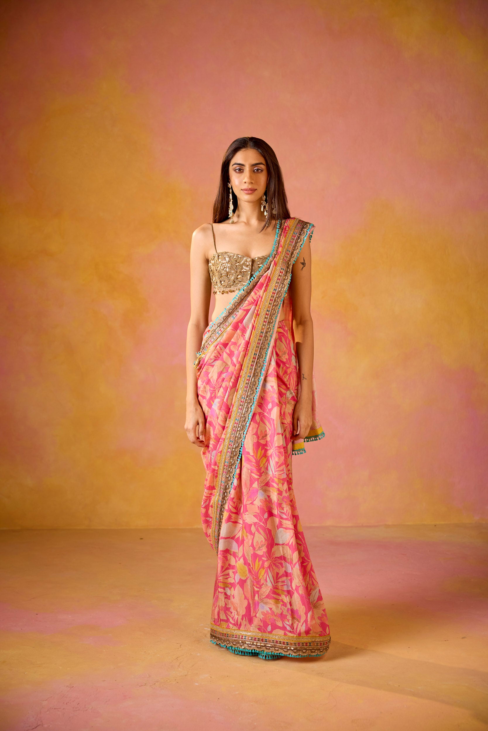 Aarohi Pink Muslin Saree With Gold Embroidered Blouse